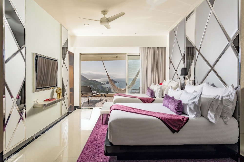 2 Bedrooms, Master, Suite, 1 King and 2 Double Beds