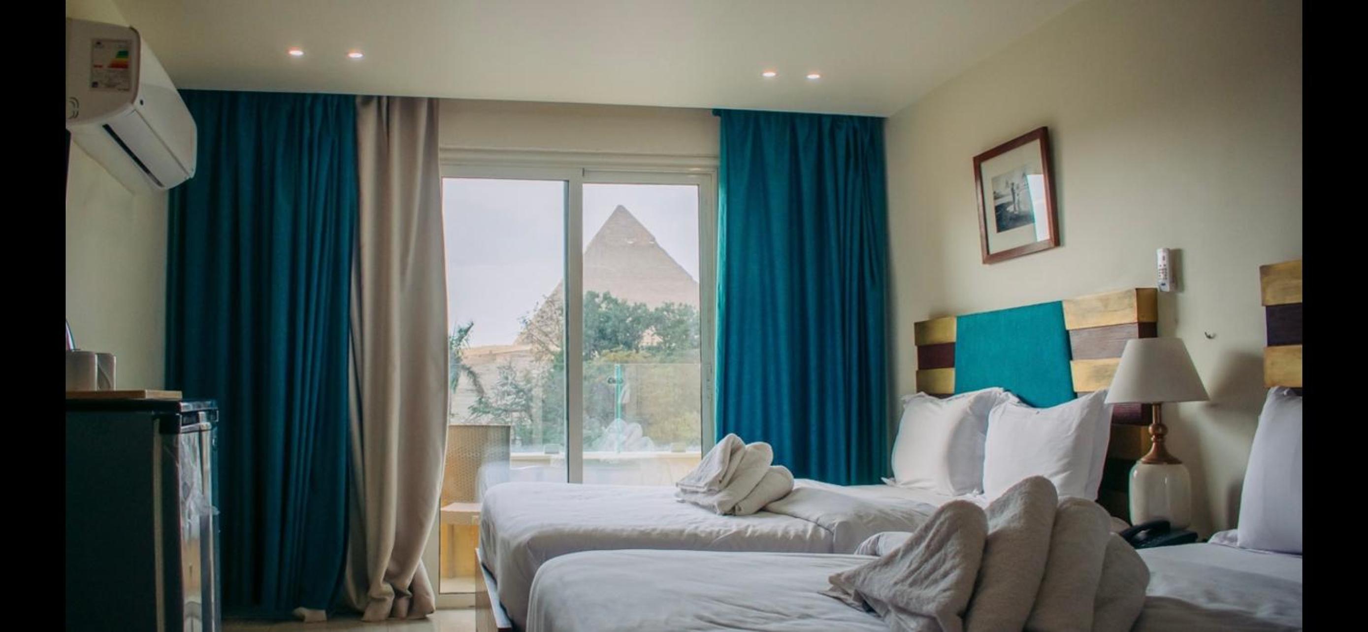 Deluxe, Quadruple, 2 Queen Beds, Pyramids View, Balcony