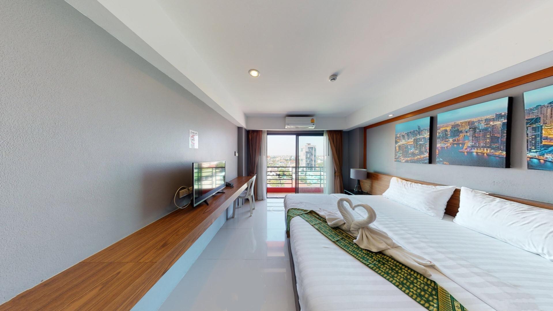 Deluxe, Triple, 1 Double and 1 Single Bed