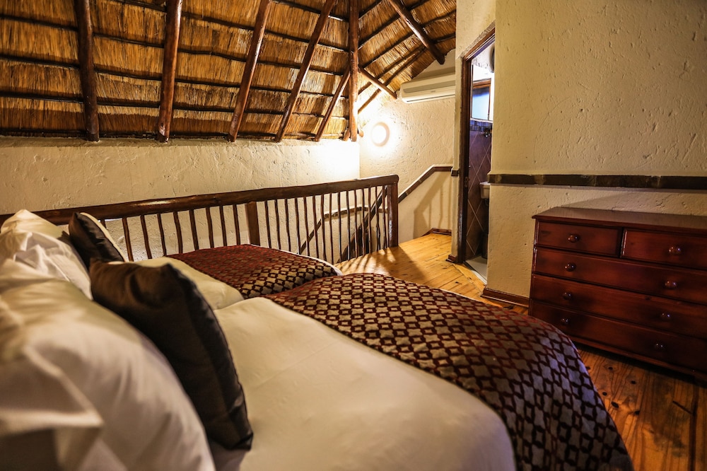 شاليه ديلوكس بإطلالة على الحديقة بغرفتي نوم، Grand Kruger Lodge And Spa 6/7