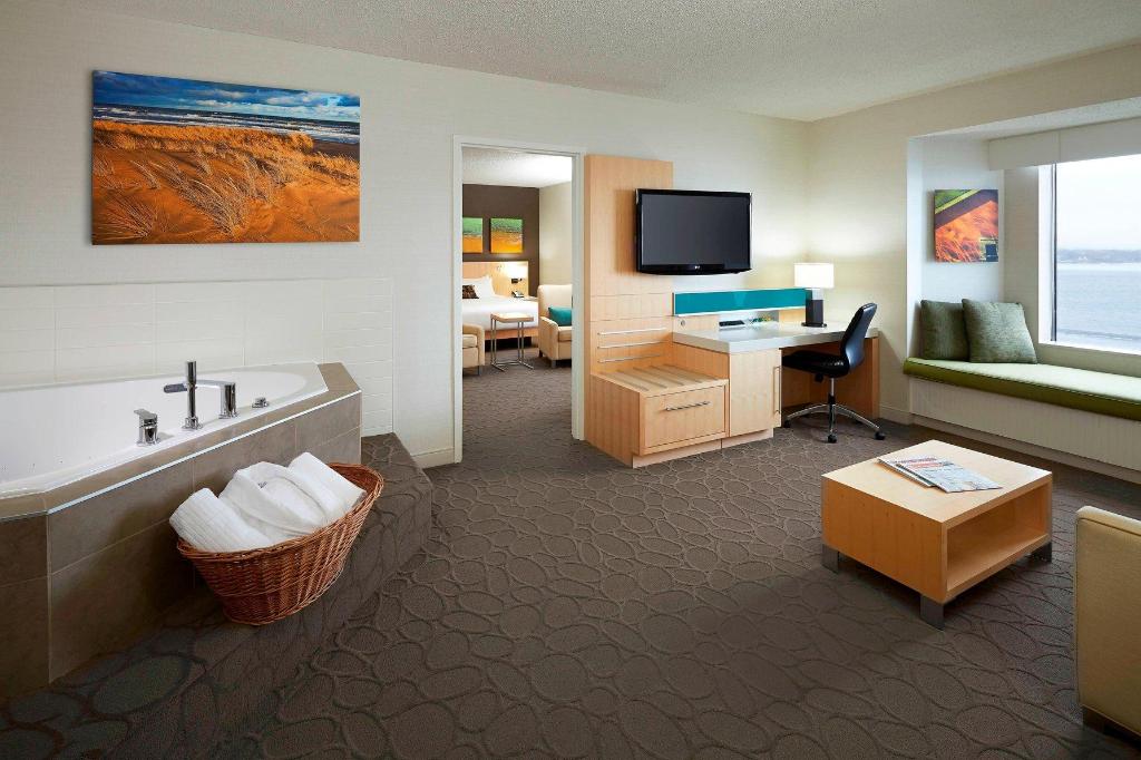 1 Bedroom, Deluxe, Suite, King Bed, Water View, Sofa, Jetted Tub