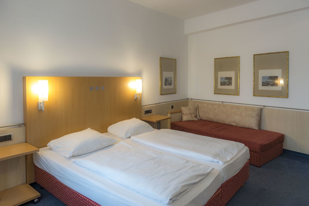 Das Kleine Stadthotel 14/32