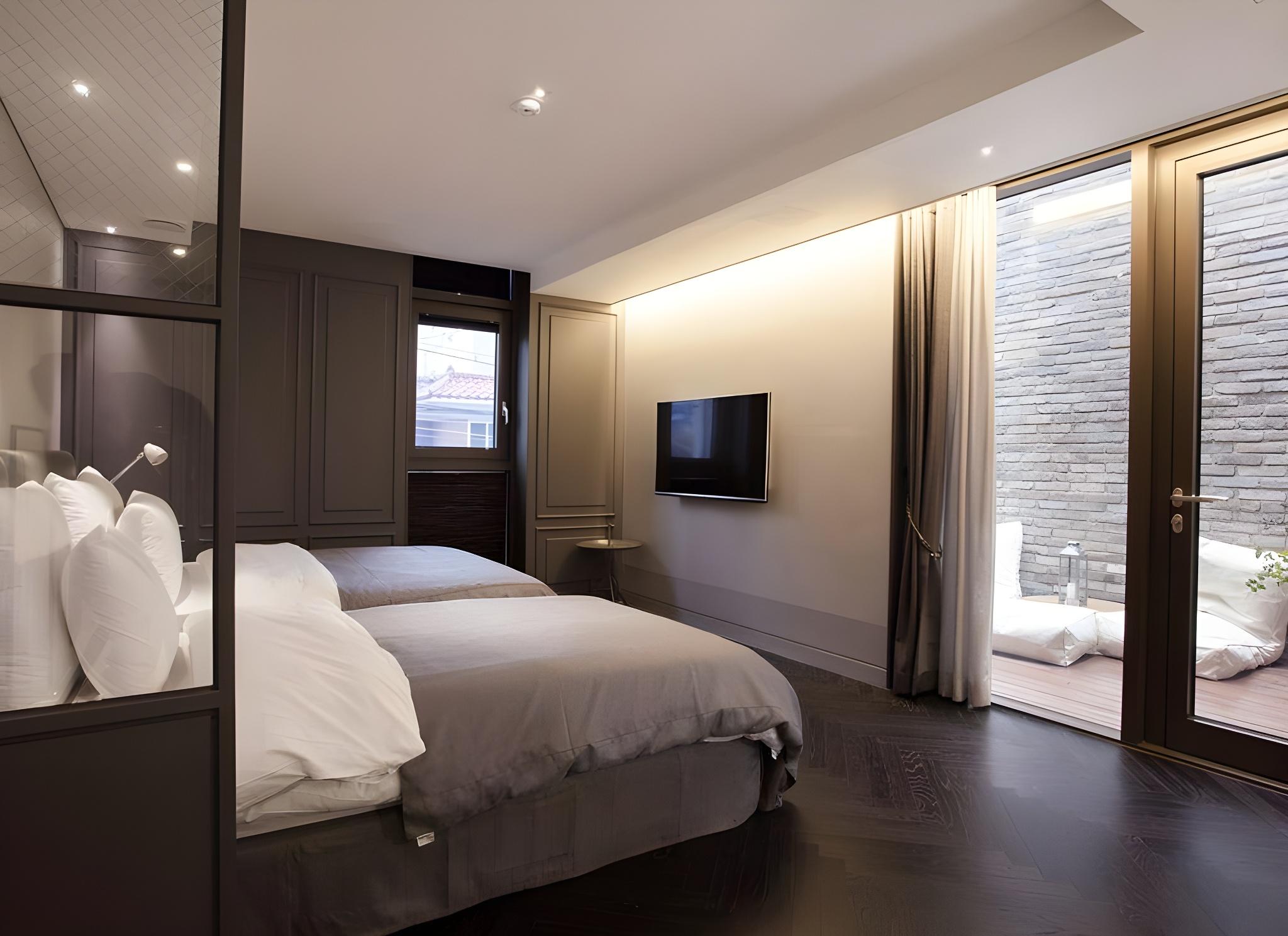 غرفة بسريرين منفصلين بشرفة، Gaden Hotel 2/2