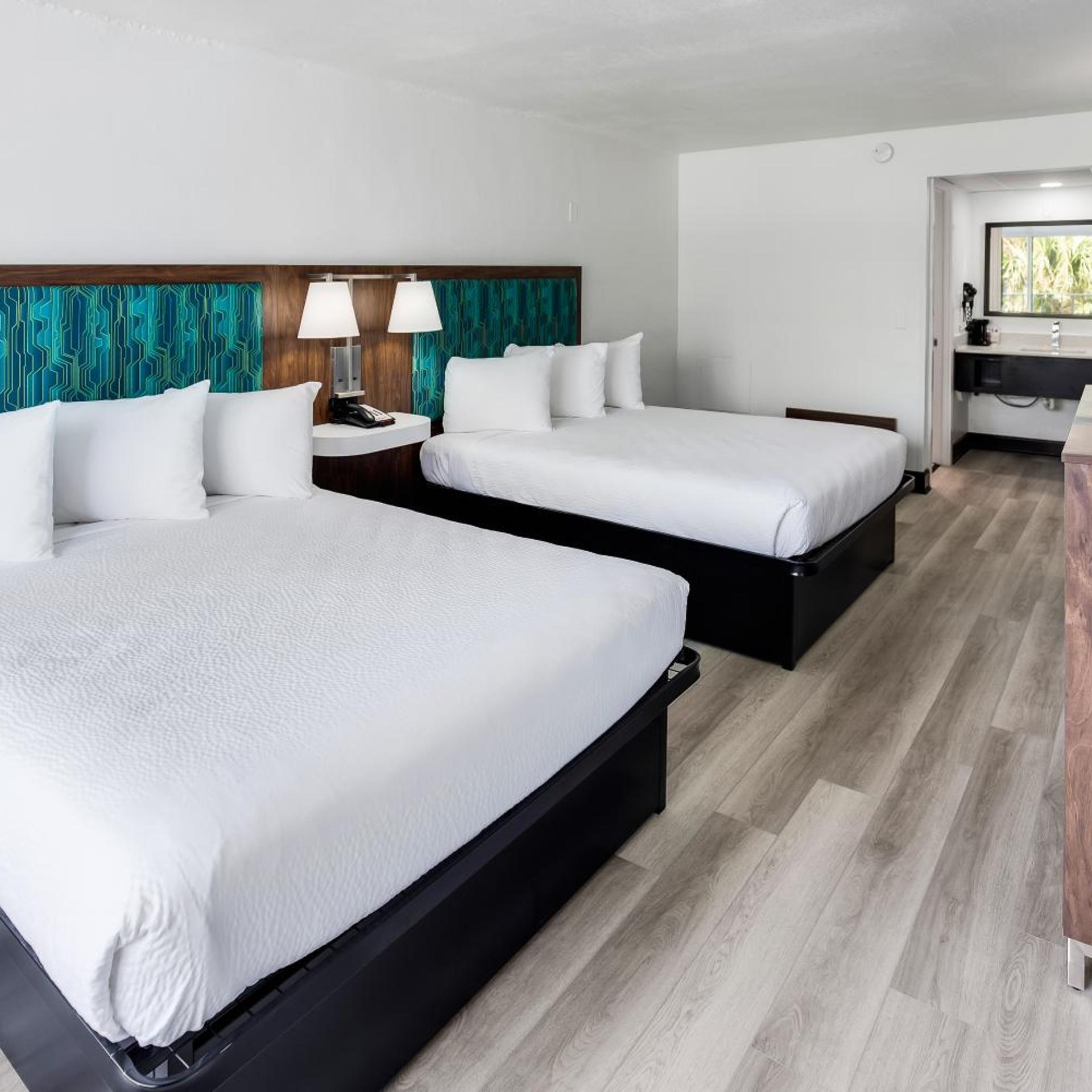 Room, 2 Queen Beds, Partial Ocean View, Side View