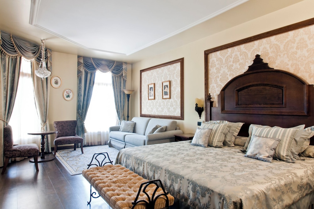 غرفة ديلوكس بسرير كينج مع أريكة، PortAventura Hotel Lucys Mansion 5/7