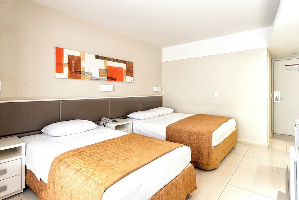 Deluxe, Triple, 1 Double and 1 Single Bed