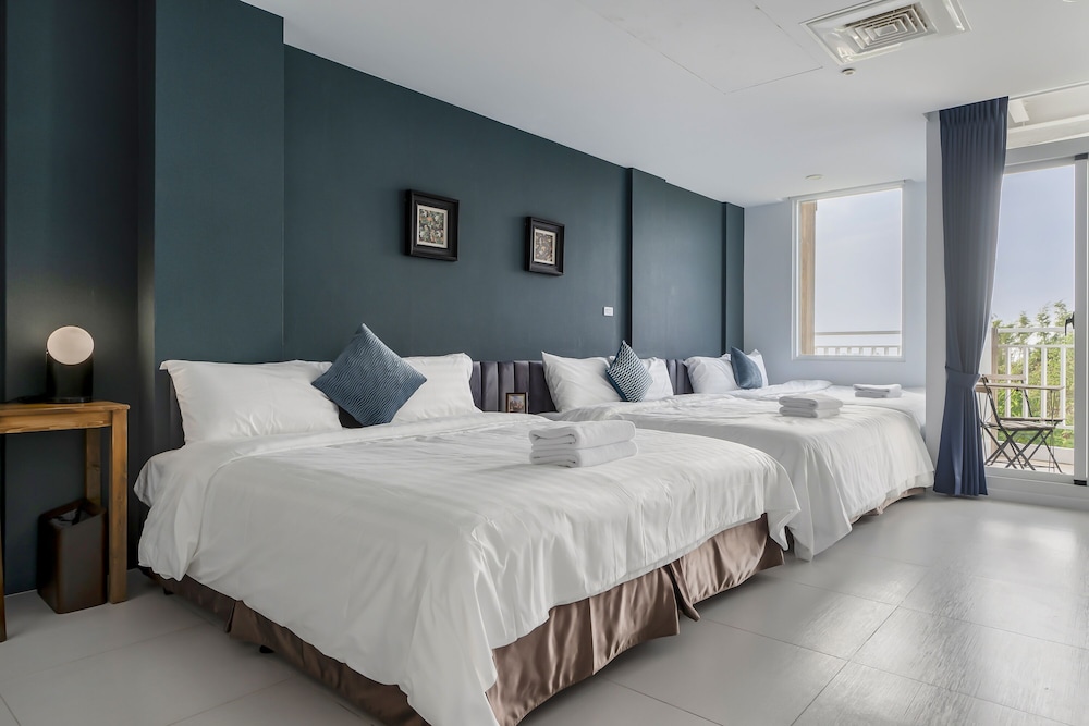 غرفة عائلية بسريرين مزدوجين بشرفة، Nan Fang B&B 2/7