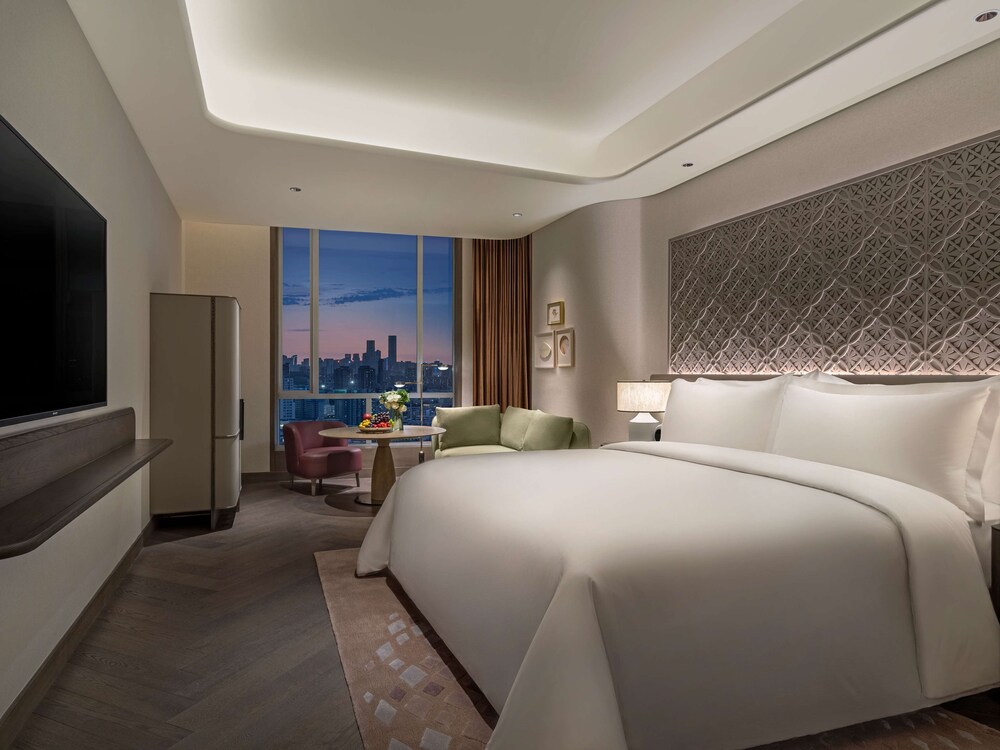 Conrad Urumqi 13/43