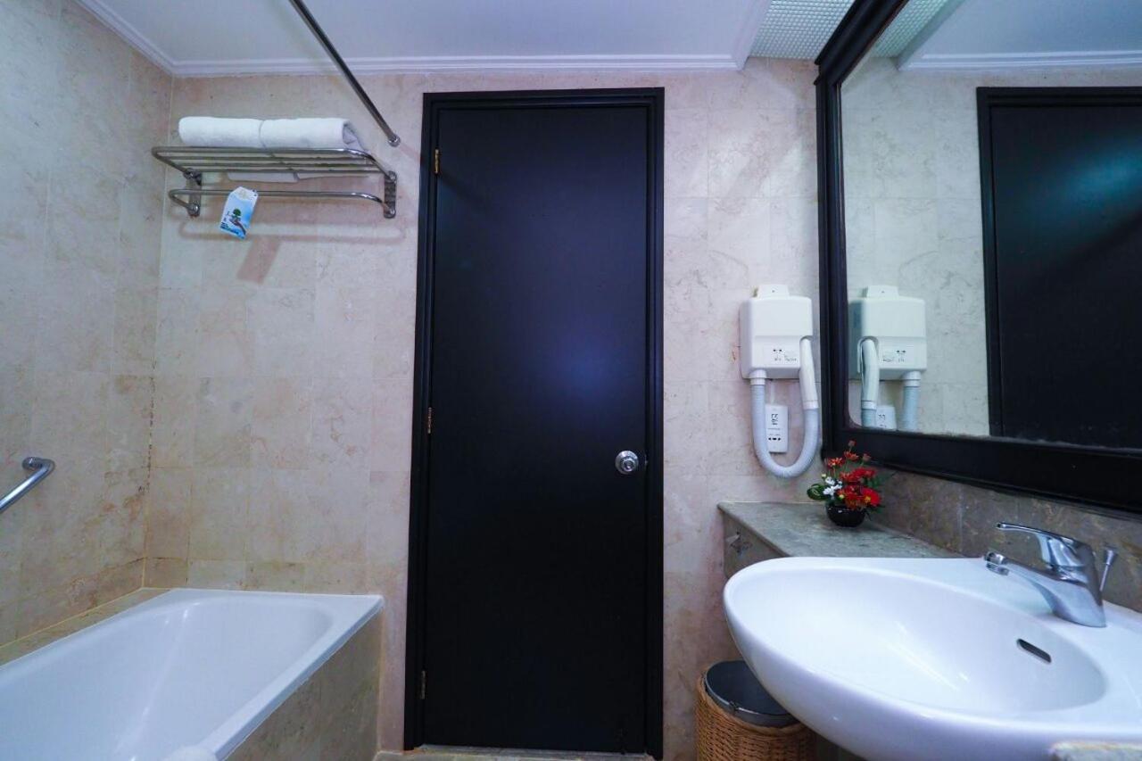 غرفة غراند ديلوكس بسرير فردي، Grand Arkenso Park View Simpang Lima (ex. Horison Semarang) 2/2