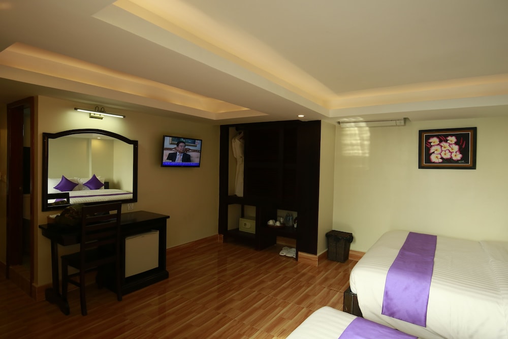 غرفة ديلوكس ثلاثية بسرير كينج وسرير فردي، Chheng Residence 2/3