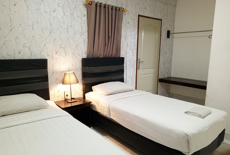 The Garden Hotel Gorontalo 4/11