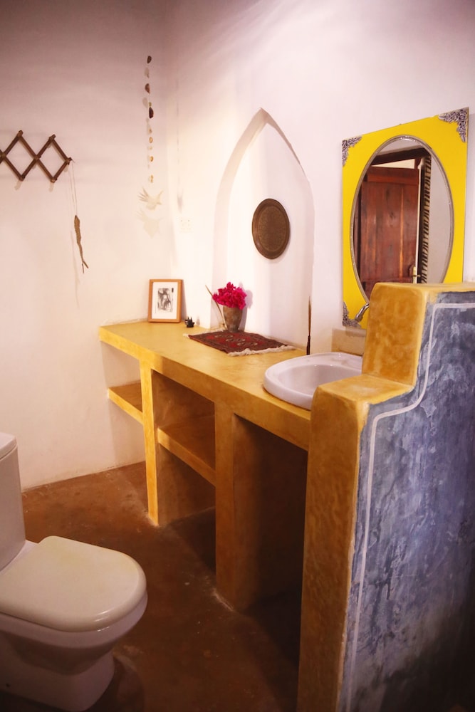 Mango Beach House 50/50