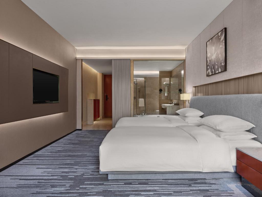 غرفة ديلوكس بسريرين منفصلين بإطلالة على المدينة، Dongguan Forum Hotel and Apartment 2/9