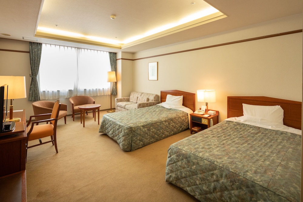 DELUXE, TWIN BEDS