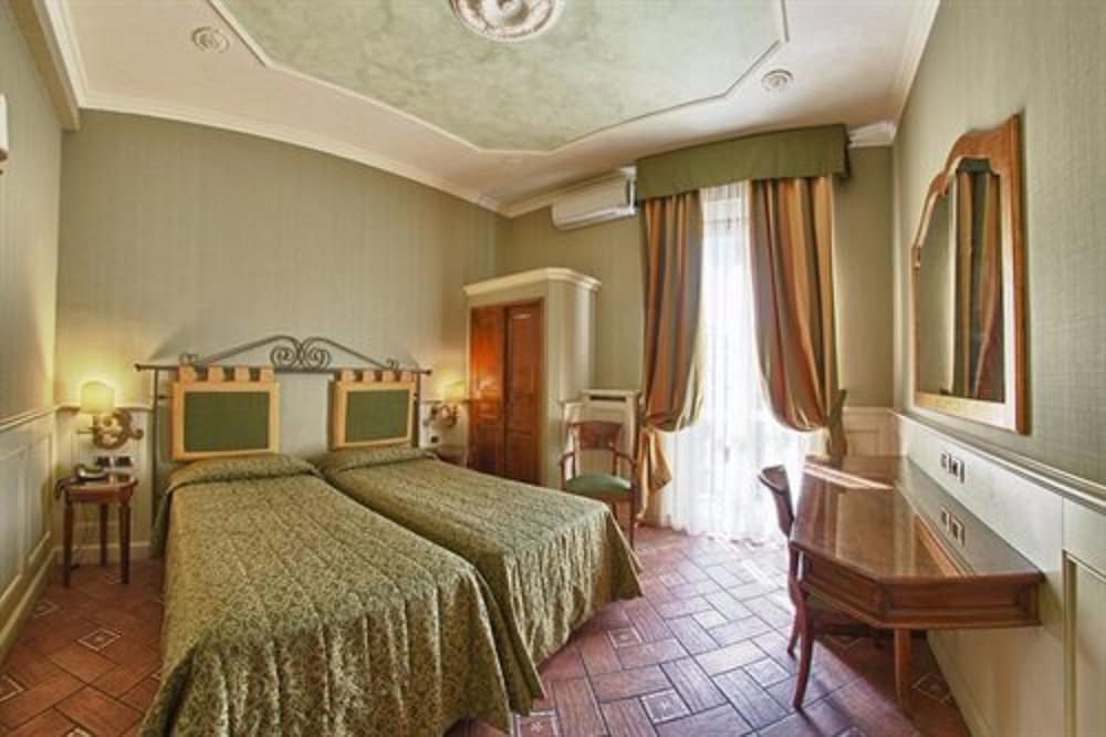 غرفة ثلاثية بسرير مزدوج وسرير فردي، Hotel Pedrini 2/7
