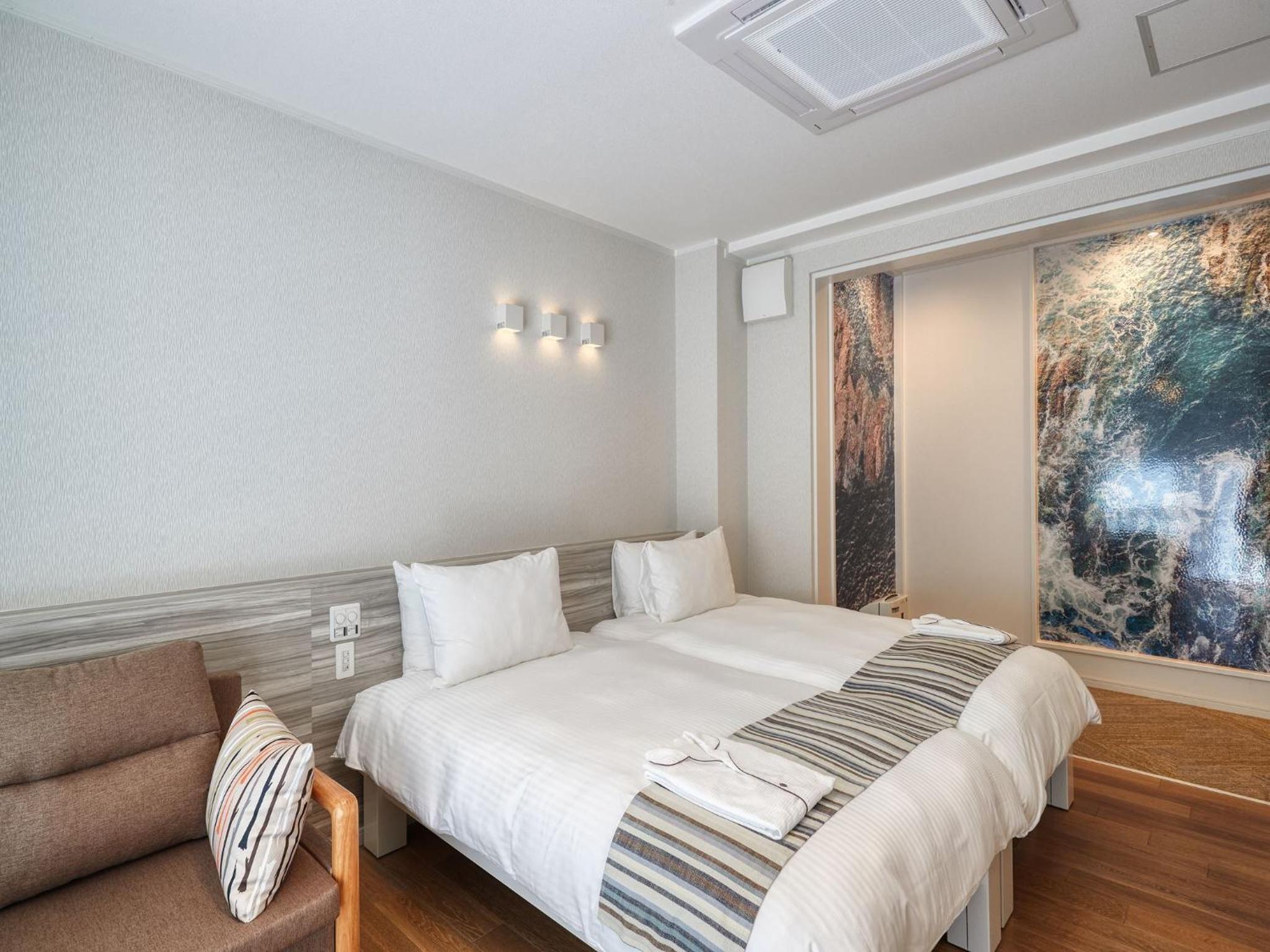 غرفة بسريرين منفصلين، La Casa Panacea Okinawa Resort 6/10