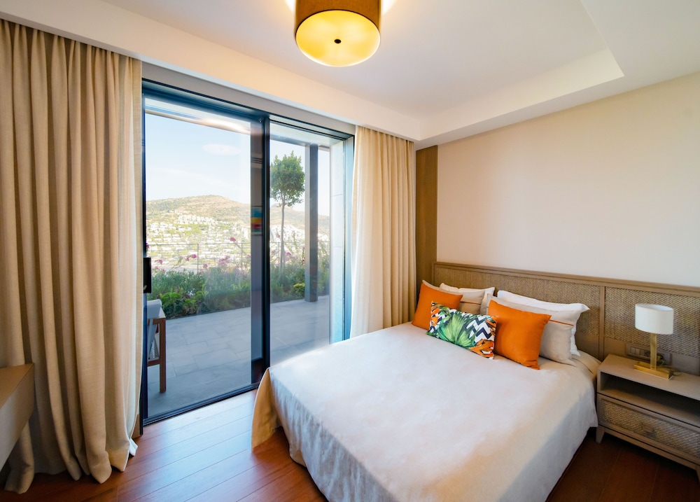 جناح ديلوكس بسرير كوين بإطلالة على البحر، Mare Deluxe Residences and Villas 3/10