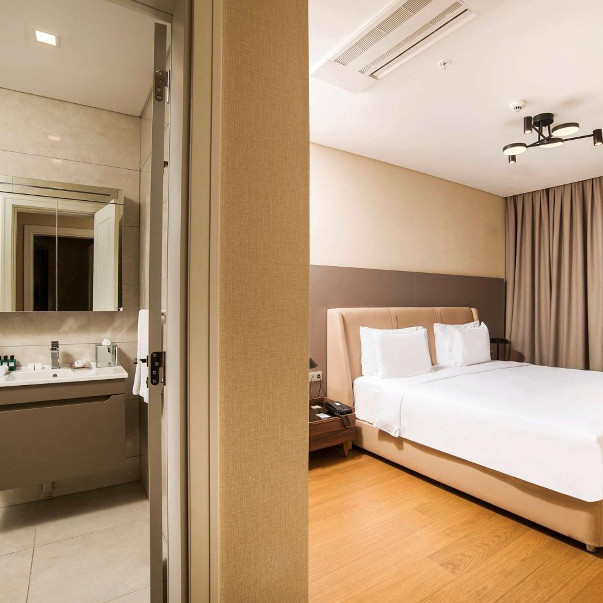 غرفة بريميوم عائلية بـ4 غرف نوم، Radisson Residences Vadistanbul 3/9
