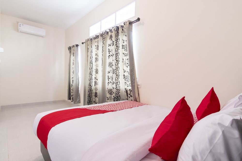 OYO 873 Kamani Homestay Syariah 12/17