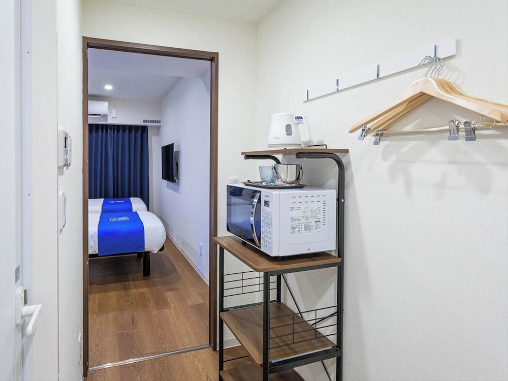 Living Inn Asahibashiekimae Premier 49/60