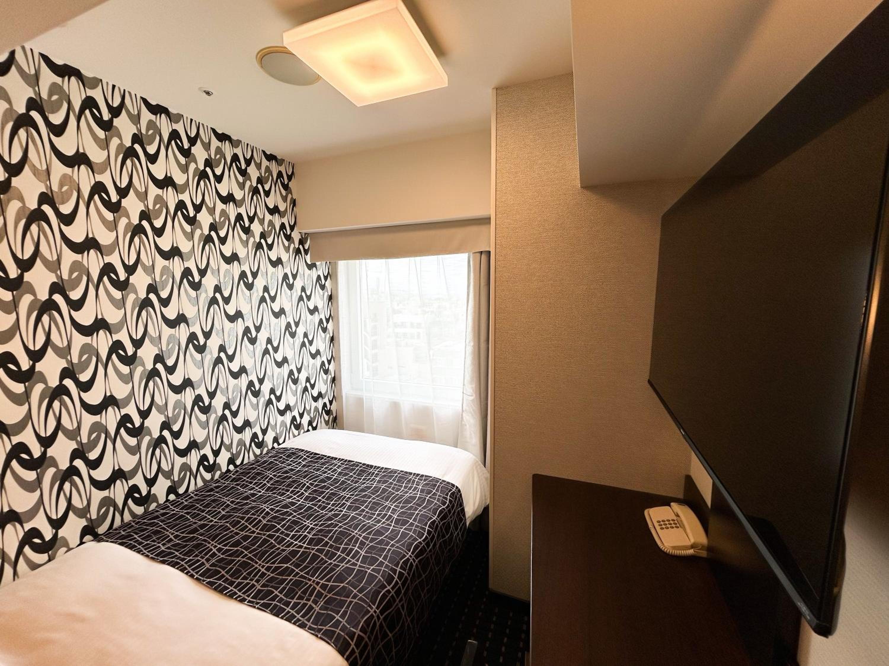 غرفة بسرير نصف مزدوج وسرير فردي، Apa Hotel Naha 8/8