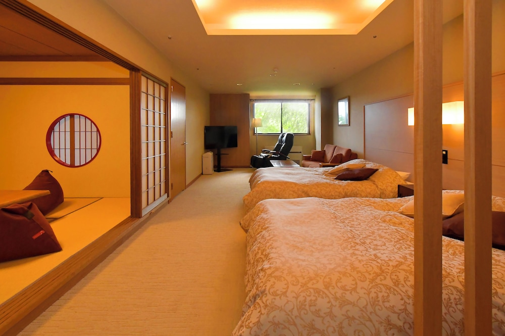 جناح بسريرين مزدوجين وفرشتي فوتون، Niseko Kombuonsen Hotel Kanronomori 3/5