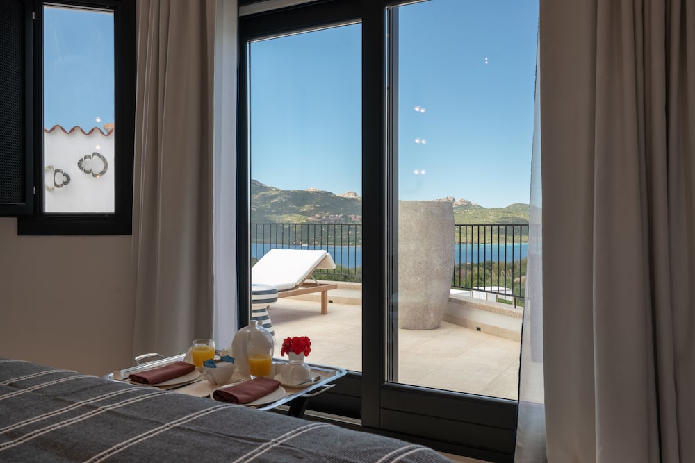 Sulia House Porto Rotondo, Curio Collection by Hilton 36/99