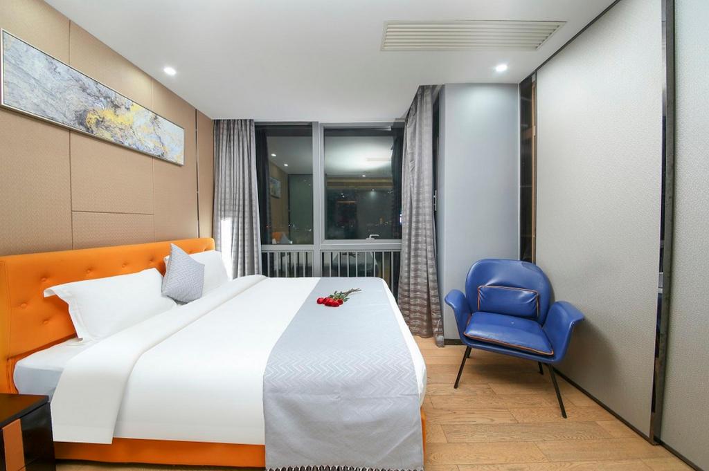 جناح تنفيذي بسرير كينج بغرفة نوم واحدة، Pengman International Apartment Hotel (Beijing Road Jiedeng Duhui) 3/10
