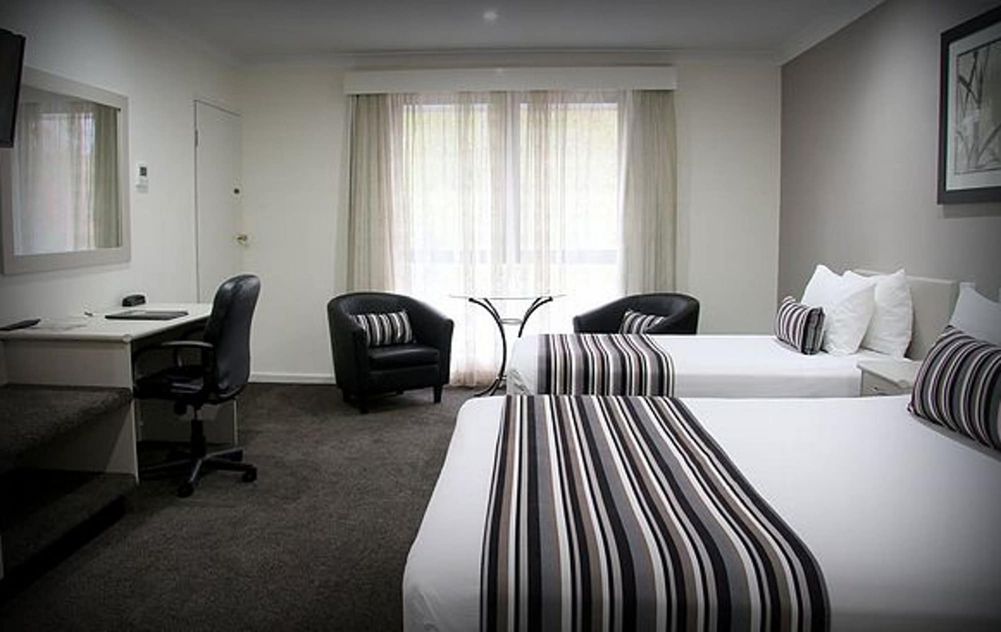 غرفة تنفيذية عائلية بسرير كوين وسريرين منفصلين، The Central Caleula Motor Lodge 4/4