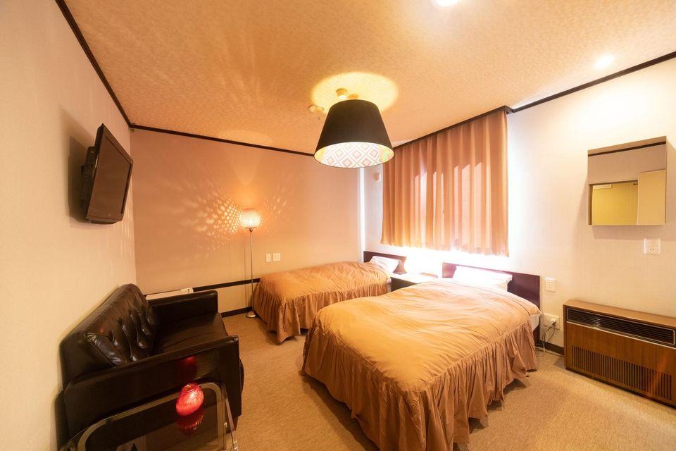 غرفة بسريرين منفصلين بحمام خاص، Kagura White Horse Inn 3/3