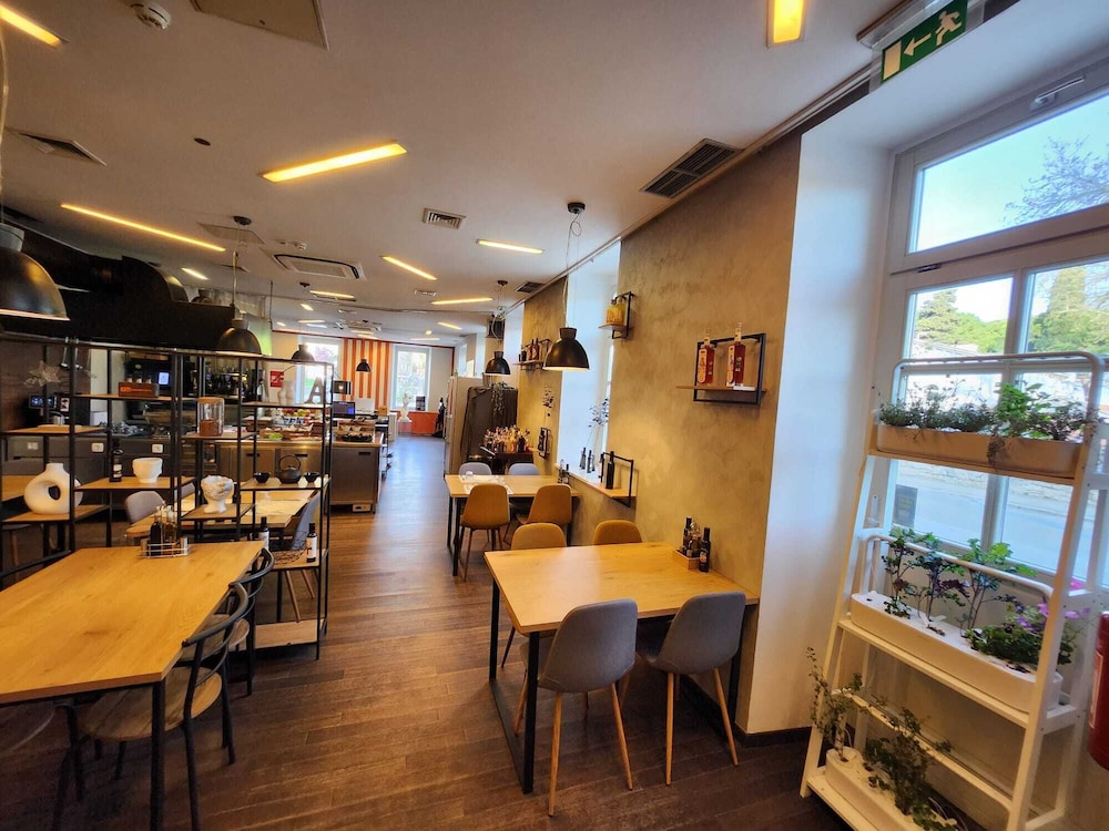 Hotel Amfiteatar 43/63