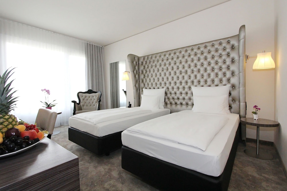 ARCOTEL John F Berlin 25/65