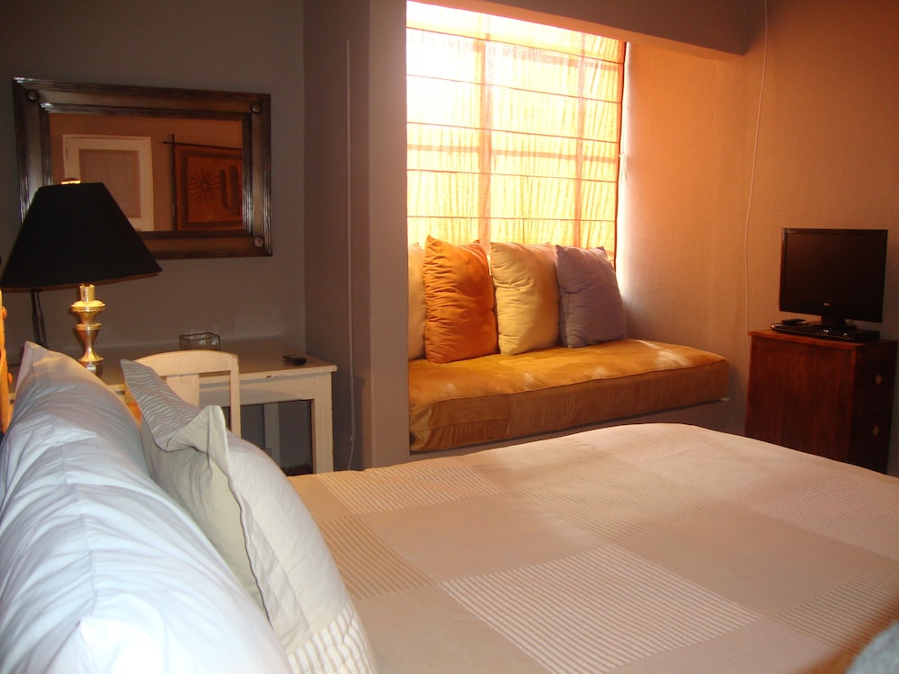 Suites Santo Domingo 24/78