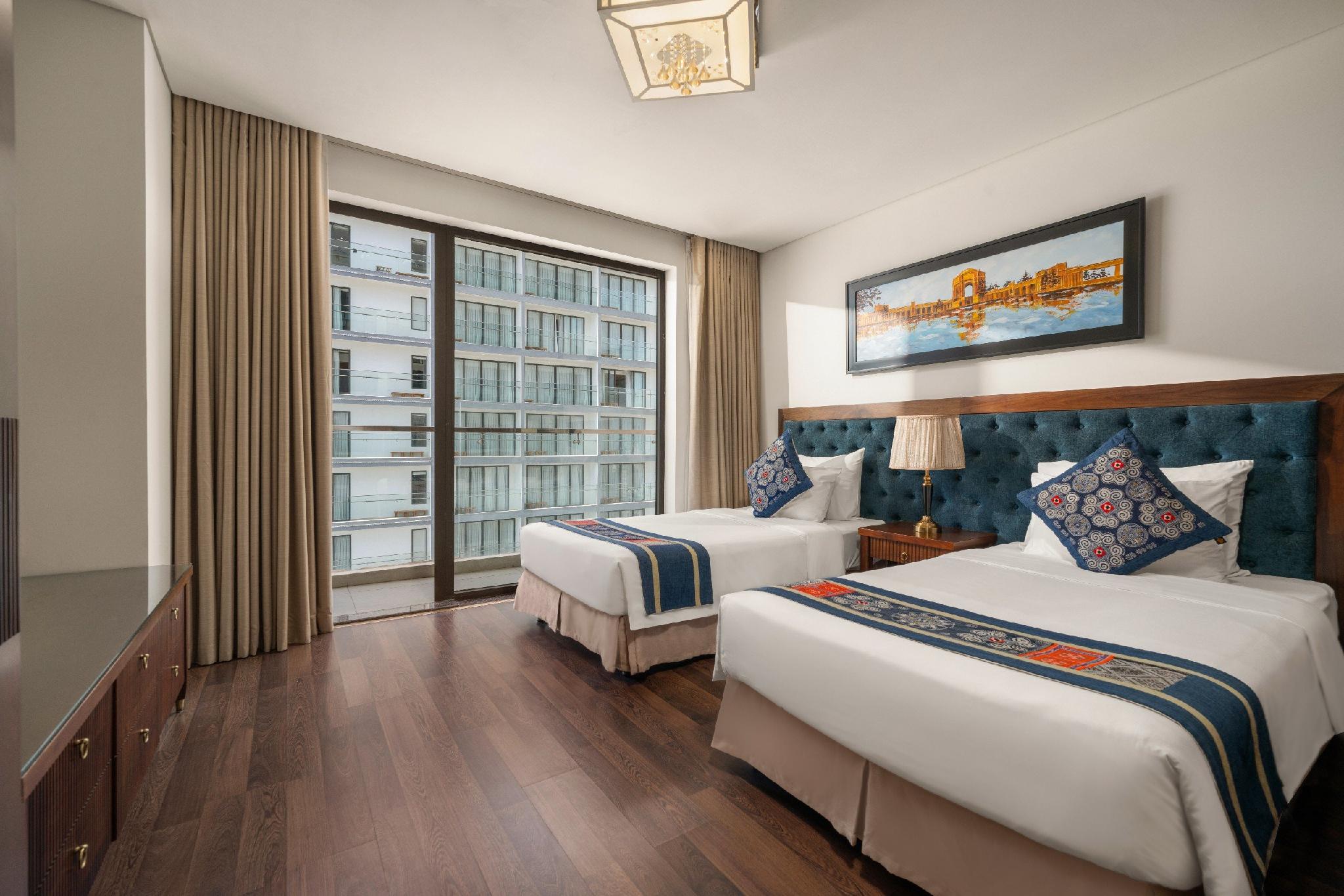 استوديو بسرير كينج وسريرين منفصلين بإطلالة جزئية على البحر، Balcona Hotel Da Nang 2/2