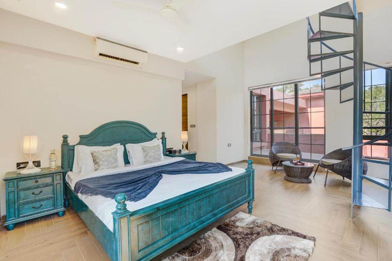 Room at ELIVAAS Villa 39 Serene 6 BHK Retreat with Pvt Pool, Gaming Zone & Balcony, LONAVALA