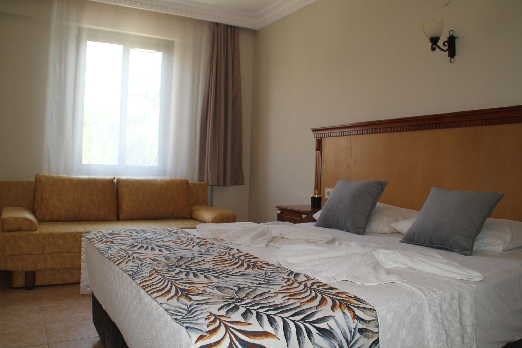 شقة عائلية بسرير فردي بإطلالة على الحديقة بغرفة نوم واحدة مع أريكة، Rosy Suites Hotel 2/9