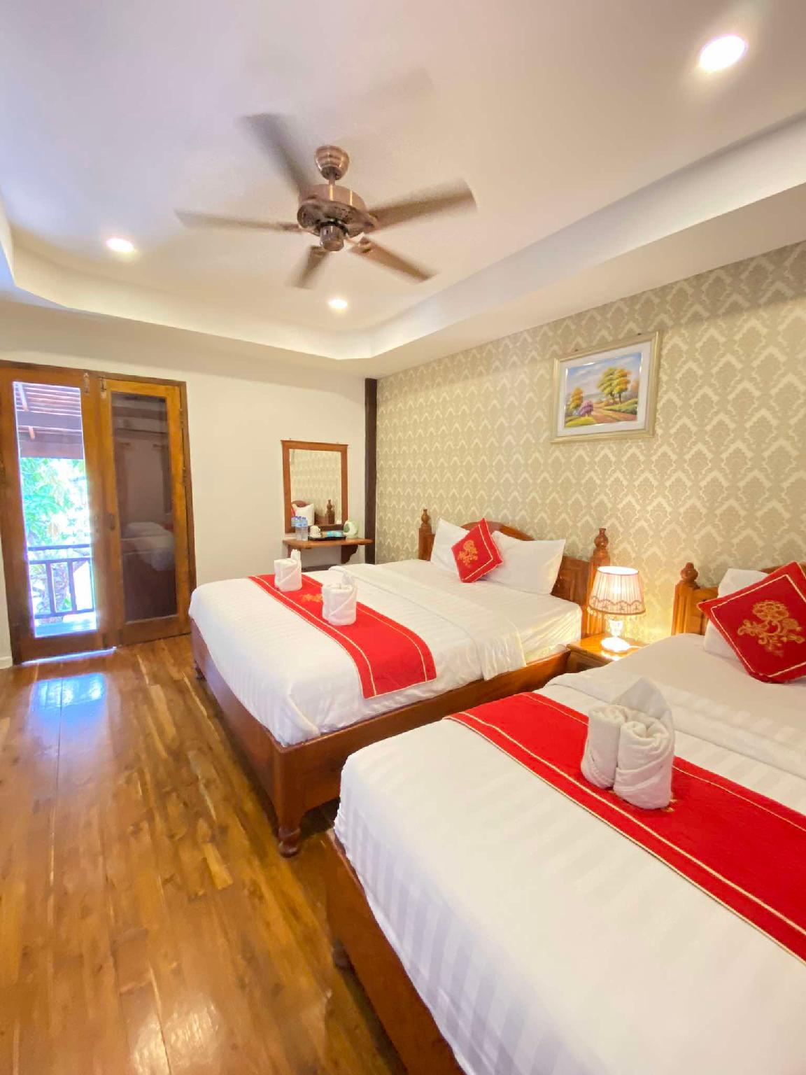 غرفة ديلوكس عائلية بسريرين كوين بشرفة