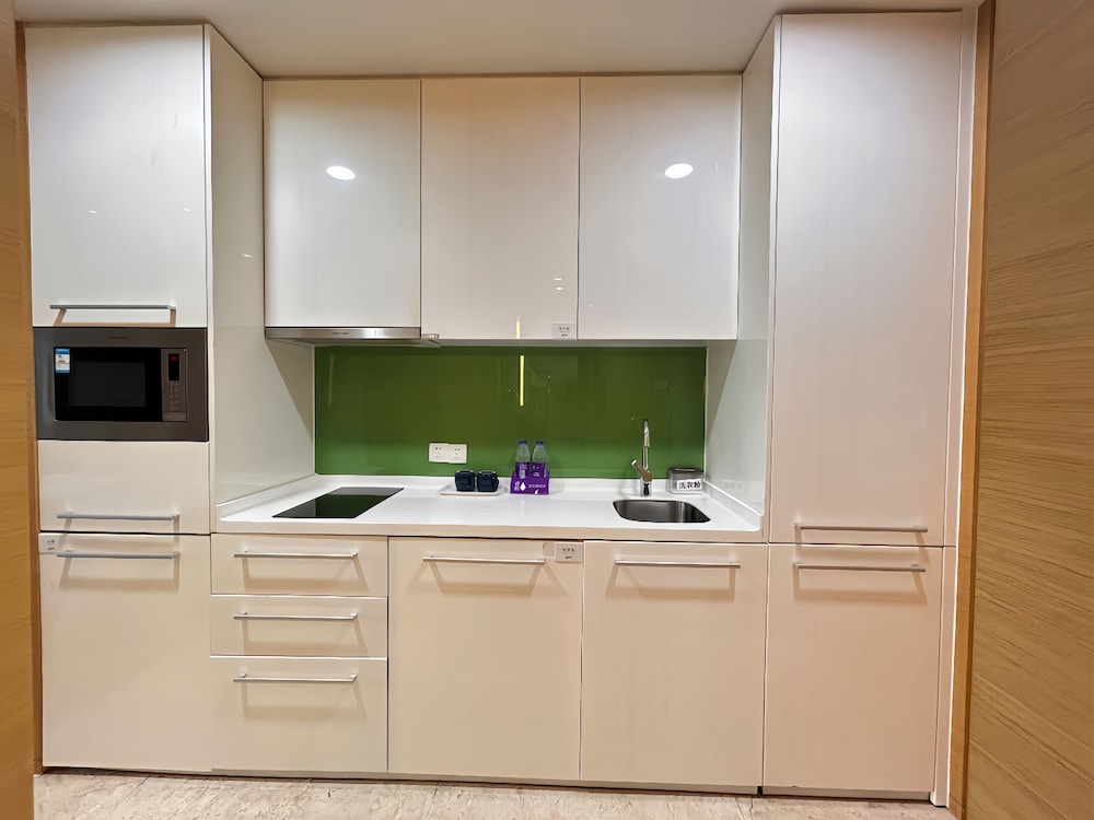 Xingyi International Hotel Poly Store 60/70