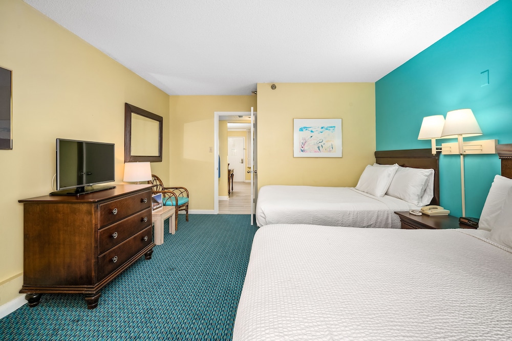 جناح بسرير مزدوج يُسمح فيها بالحيوانات الأليفة، Cayman Suites Hotel 2/4