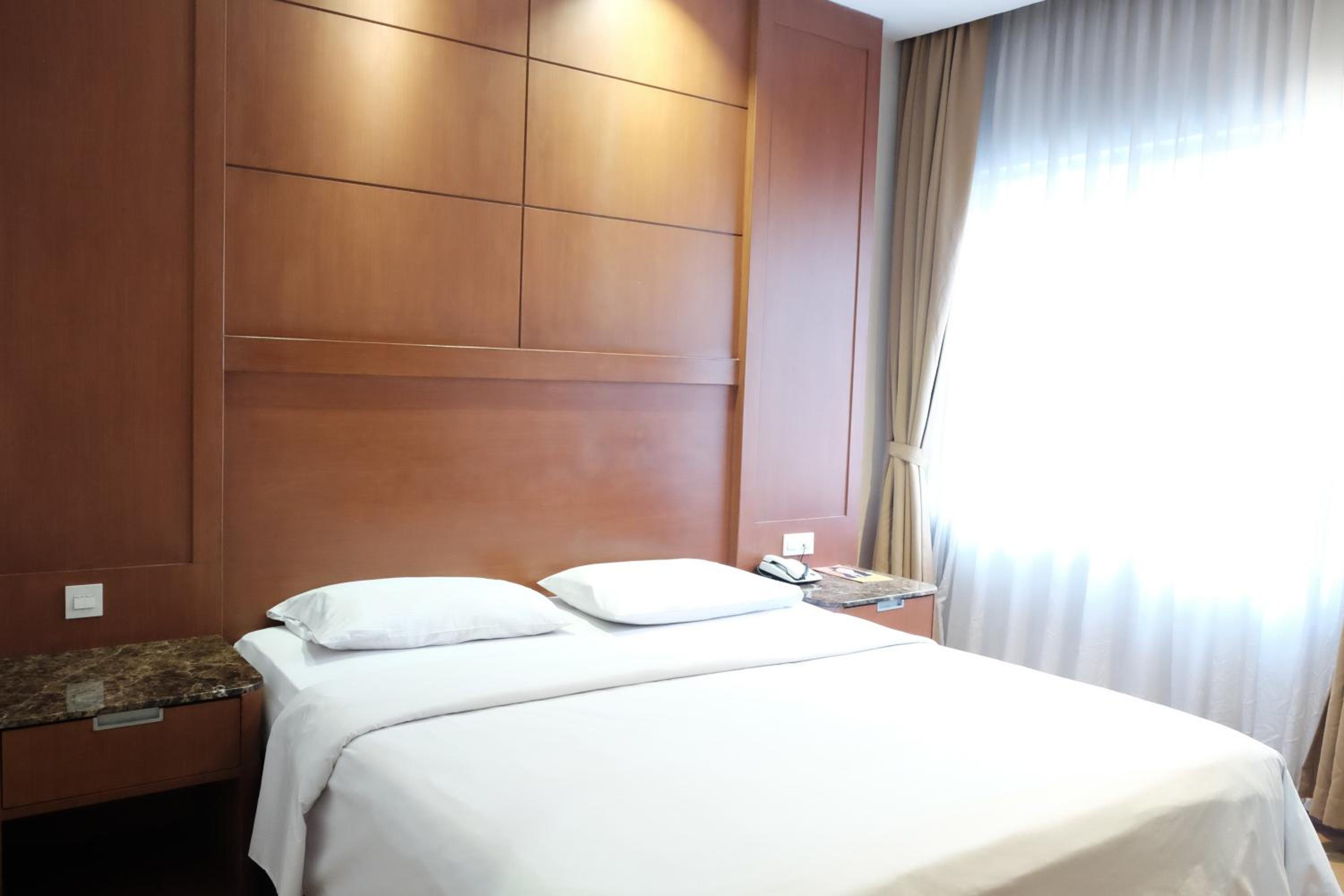 غرفة ديلوكس بسرير مزدوج للمدخنين، Grand Sakura Hotel 2/6