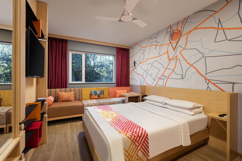 Deluxe, Queen Bed, Ginger Nagpur, Airport Road 5/5