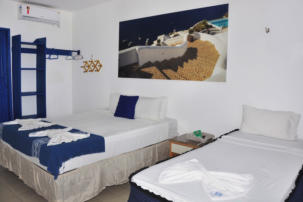 Master, Suite, Triple, 1 Double and 1 Single Bed، La Suite Praia 7/10