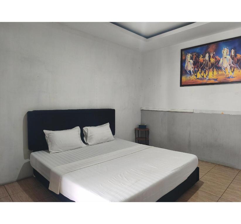 Room at Hotel O near Mall Boemi Kedaton formerly House Of Tuwuh 1, BANDAR LAMPUNG