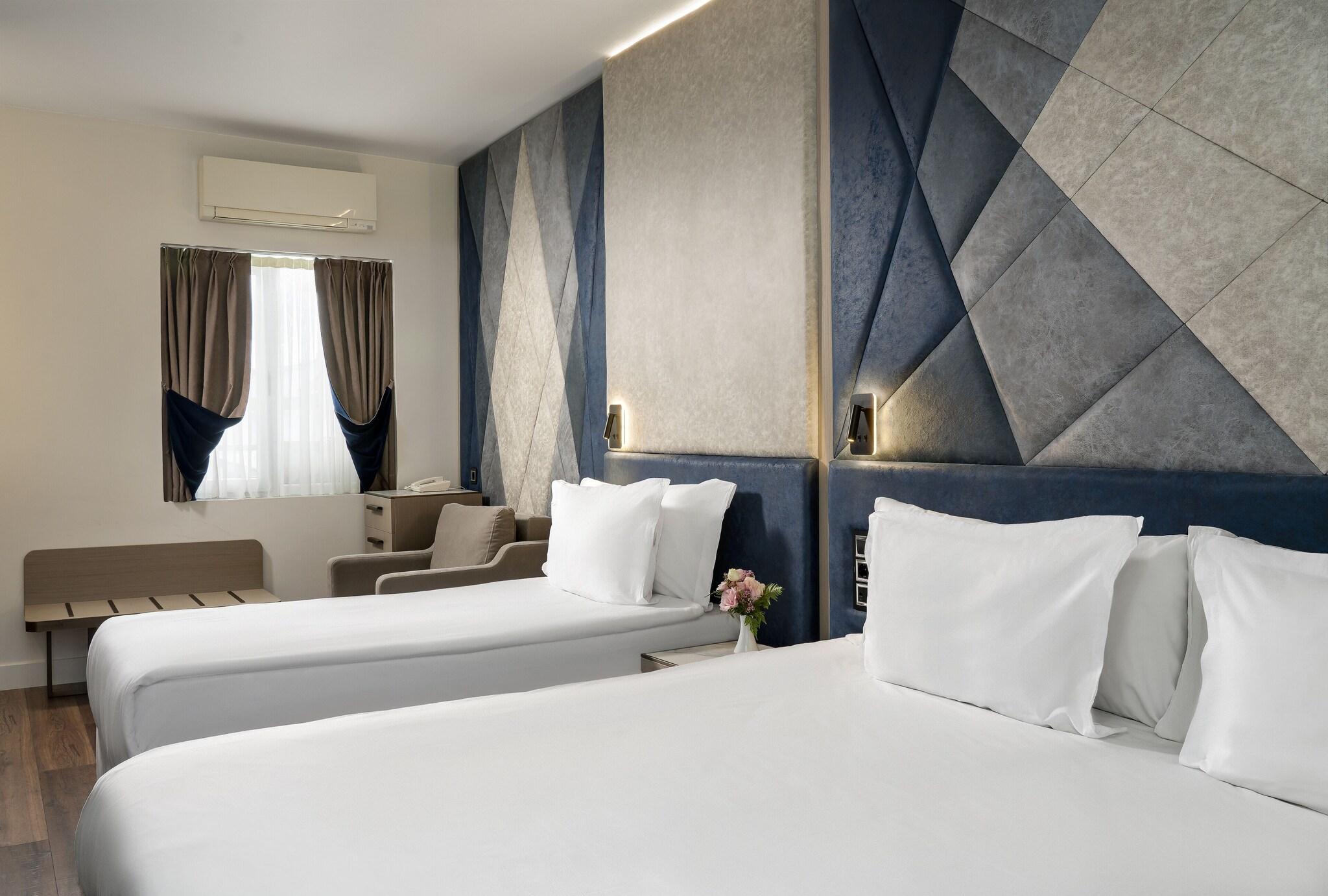 غرفة عائلية بسريرين