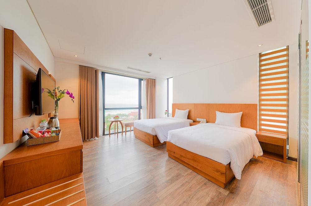 غرفة ديلوكس بسريرين منفصلين بإطلالة على البحر، Soho Boutique Da Nang Hotel 3/5
