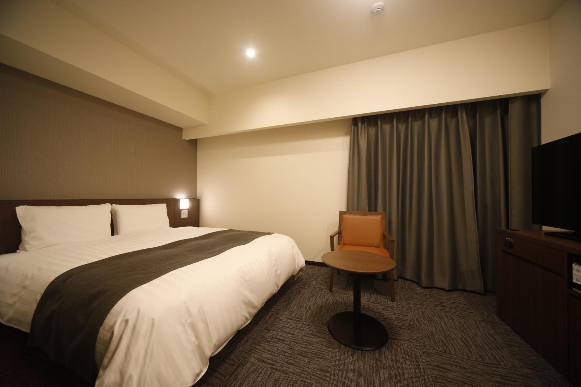 غرفة بسرير كوين مع أريكة، Dormy Inn Oita 6/9