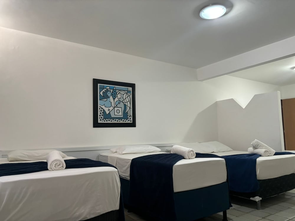 غرفة قياسية رباعية بسرير مزدوج وسريرين منفصلين، Praia Hotel Enseada 6/9