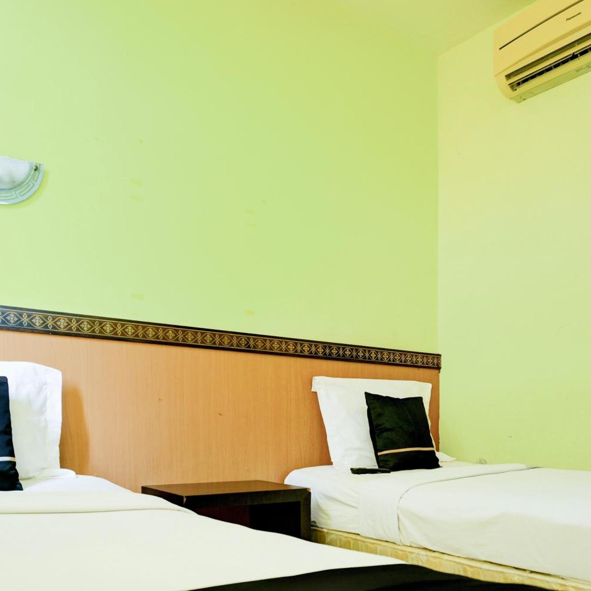 غرفة قياسية بسريرين منفصلين، OYO 2255 Hotel Aifih 4/9
