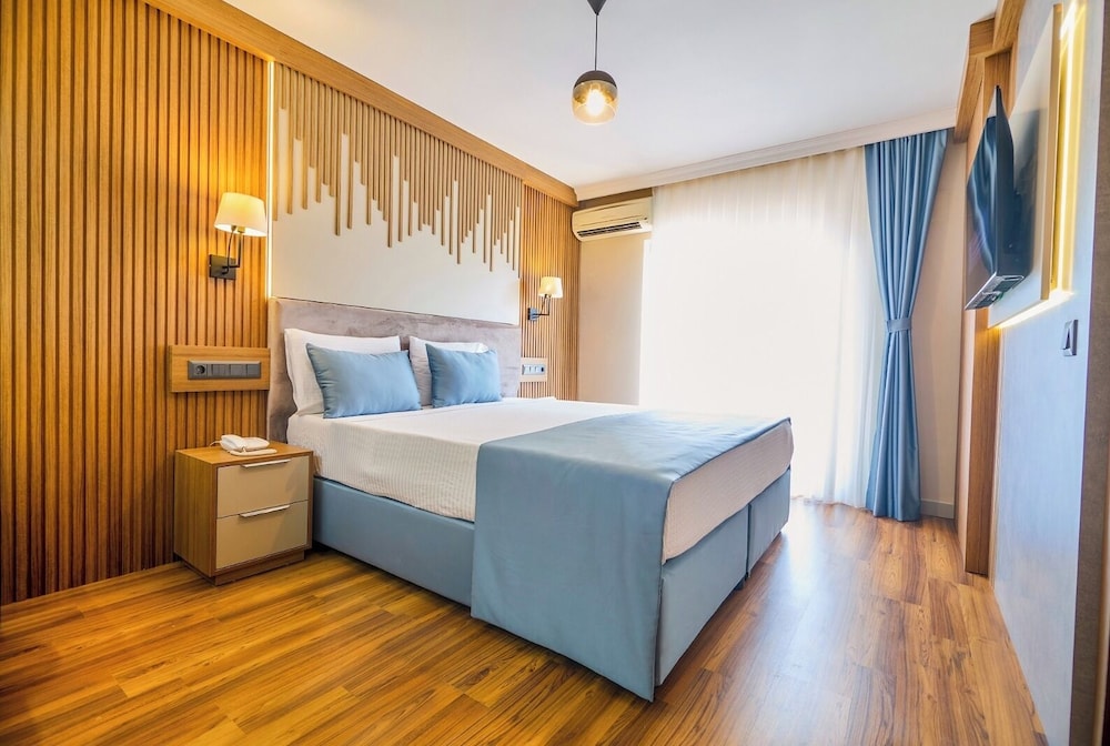 جناح بسرير مزدوج وسريرين منفصلين بإطلالة على البحيرة، Dalyan Tezcan Hotel 2/10