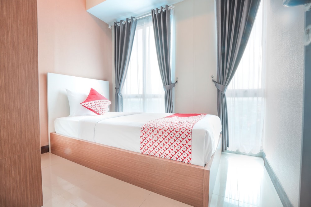 OYO Flagship 755 Appartel Grand Dhika City 21/39